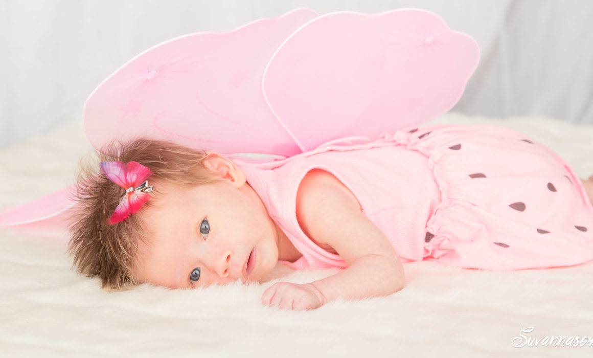 photographe genève nourrisson bébé fille rose papillon suisse famille